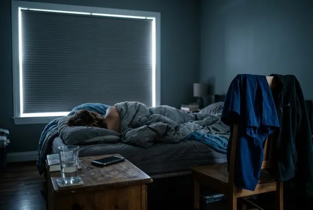 Sleeping in the middle of the day with the blinds drawn
